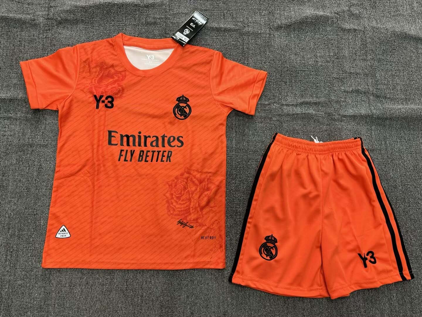 2867532673815a1ed98a91c2858f108e37b8cbc3 2024/2025 Real Madrid Y-3 Special Edition Orange Football Shirt 1:1 Thai Quality Kids Size - Image 1