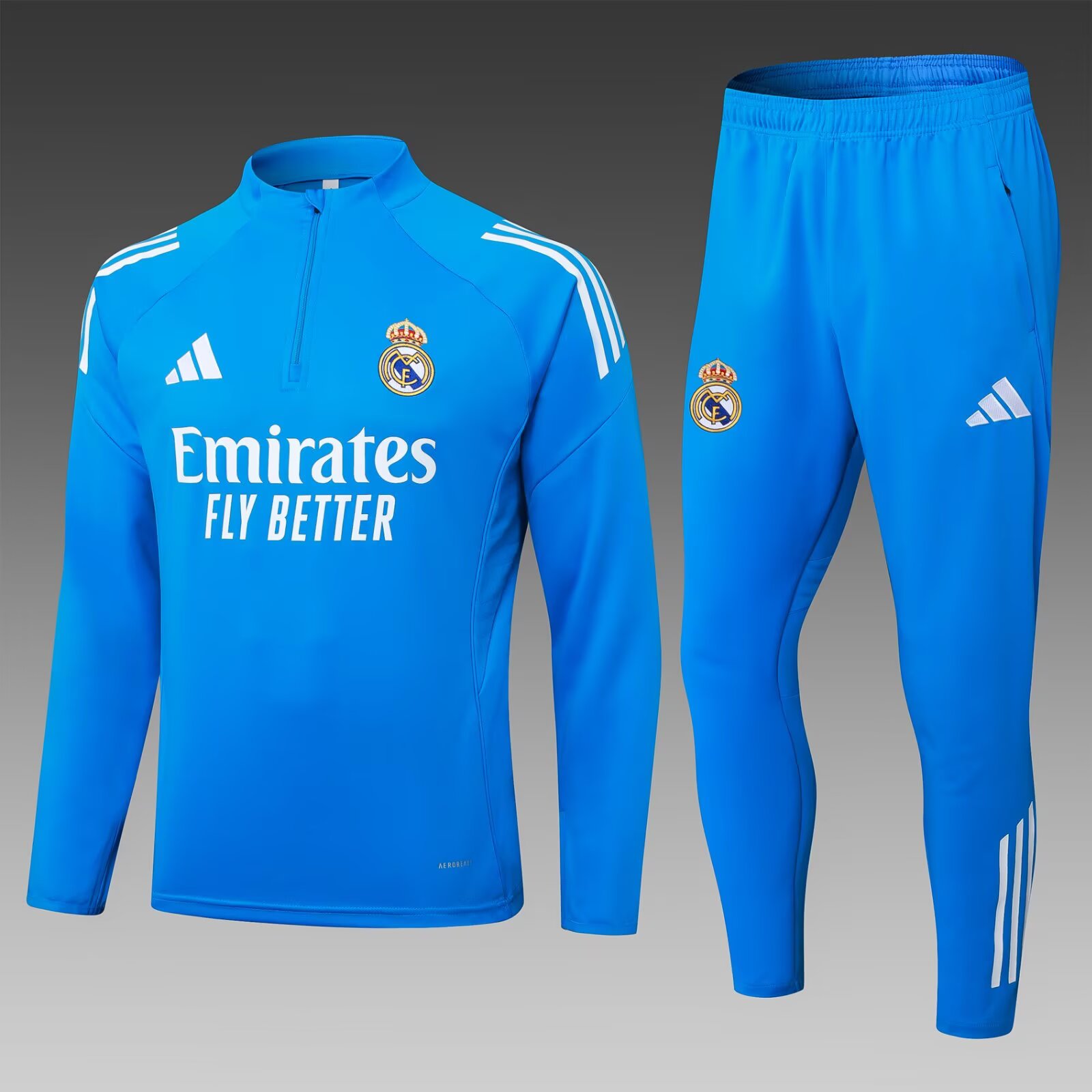 291e6346749ed59f956ab83c6e97bd13daeceb28 2025/2026 Real Madrid Half-Pull Training Suit Bright Blue Football Shirt Set - Image 1