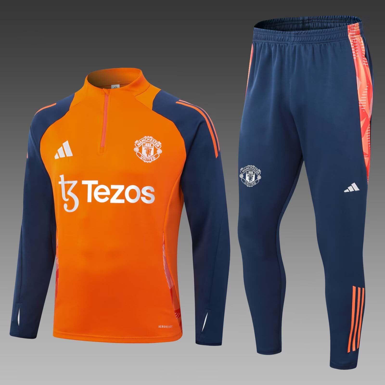 7dd443aa8085a47e05cce241f15a2dffa8e5208d 2024/2025 Manchester United Half-Pull Training Suit Orange Football Shirt 1:1 Thai Quality Set - Image 1